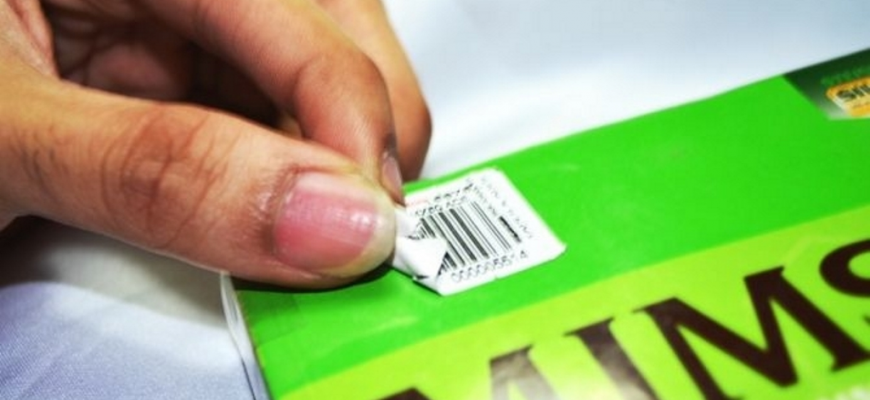 Как убрать клей с книги от этикетки